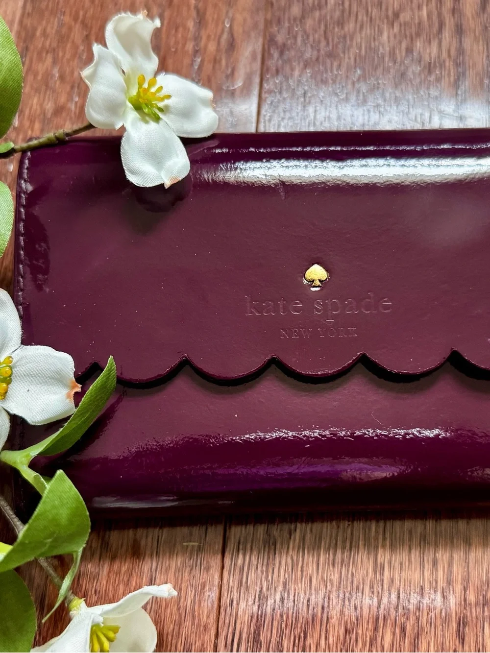 KATE SPADE Mahogany/Radish Lily Avenue Patent Leather Kieran Trifold Wallet